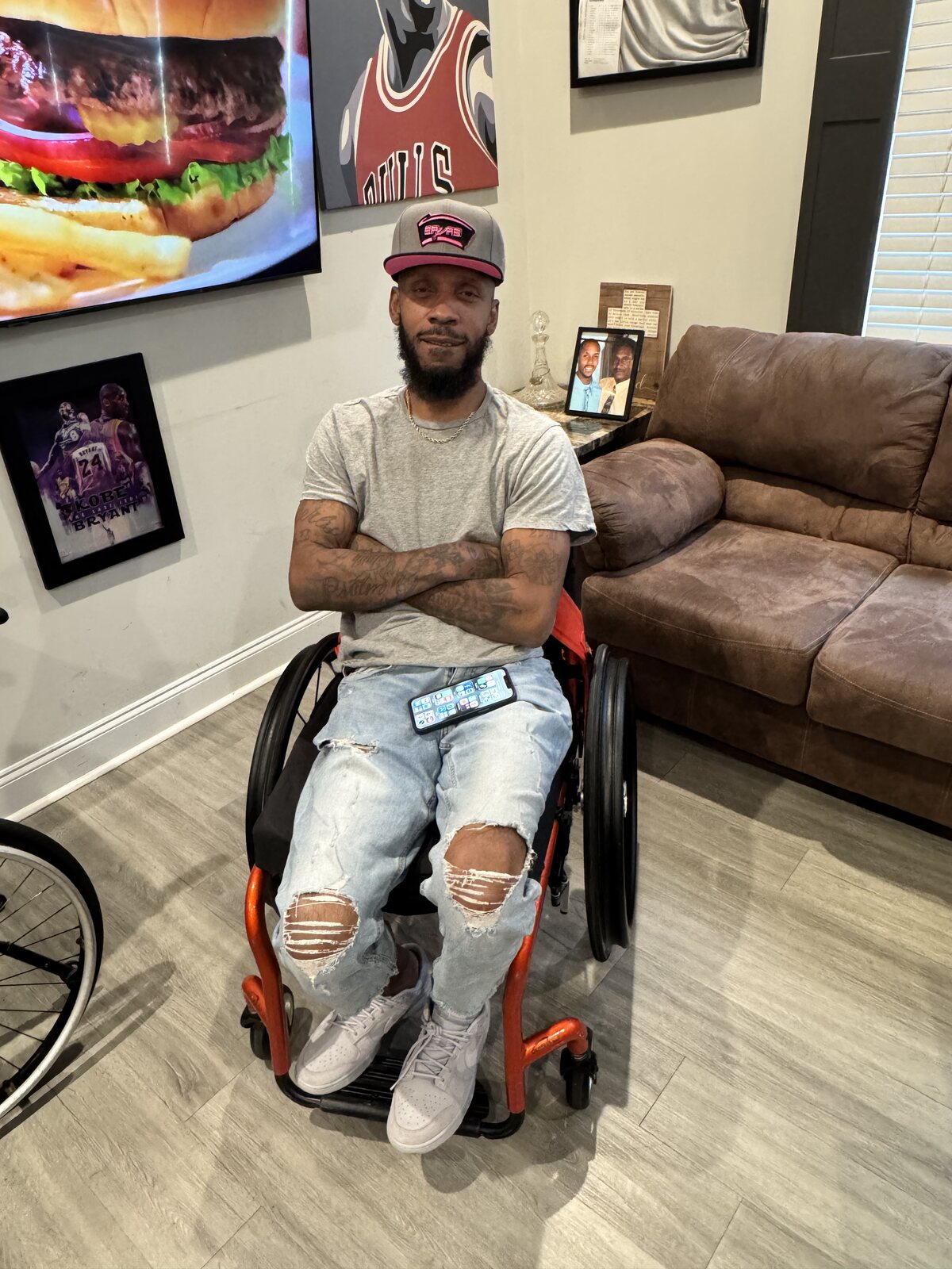 Dedrick Craft seated outdoors in his wheelchair