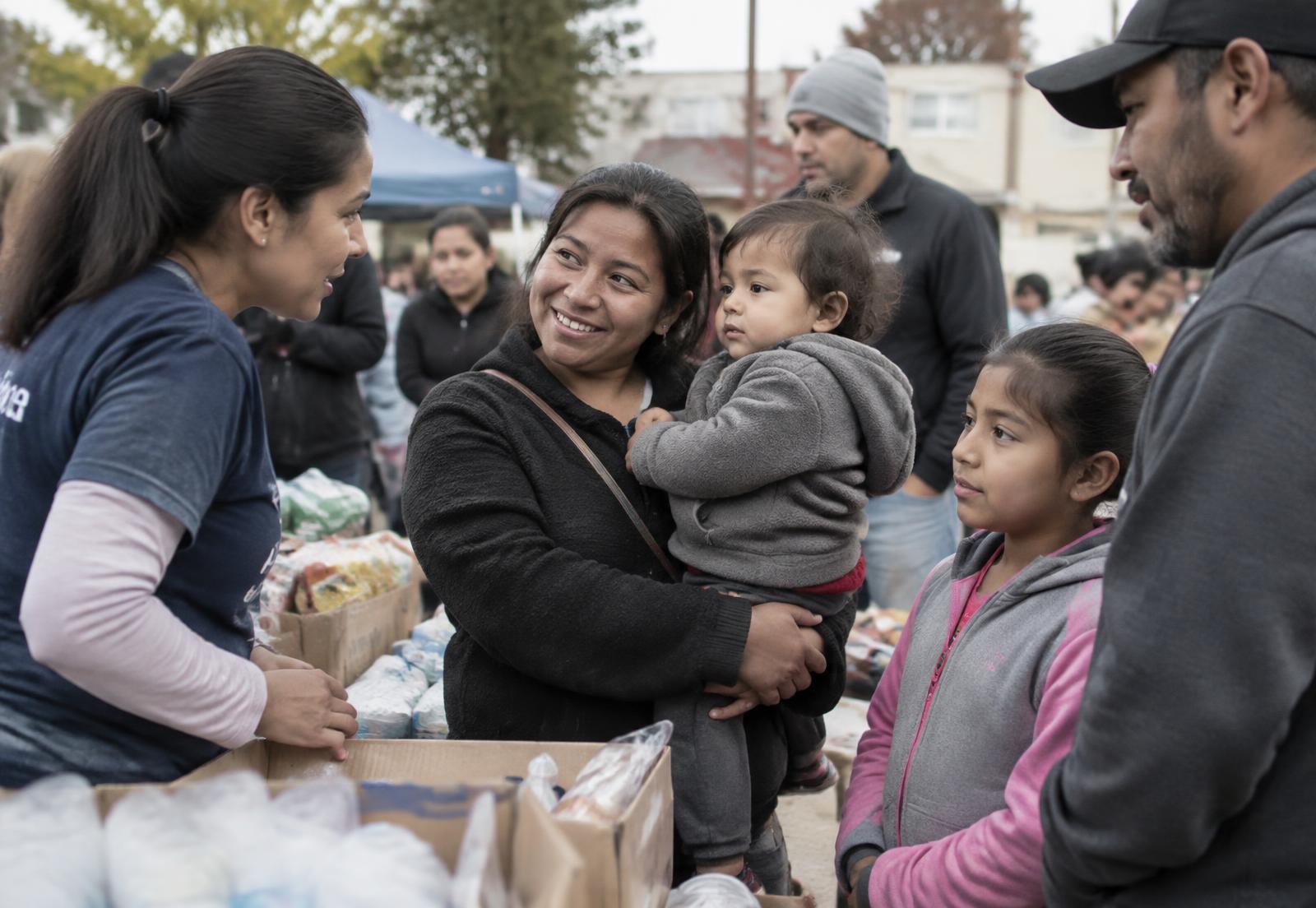 Neighbors connecting during a community support event
